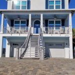 metal staircase luxury beach home